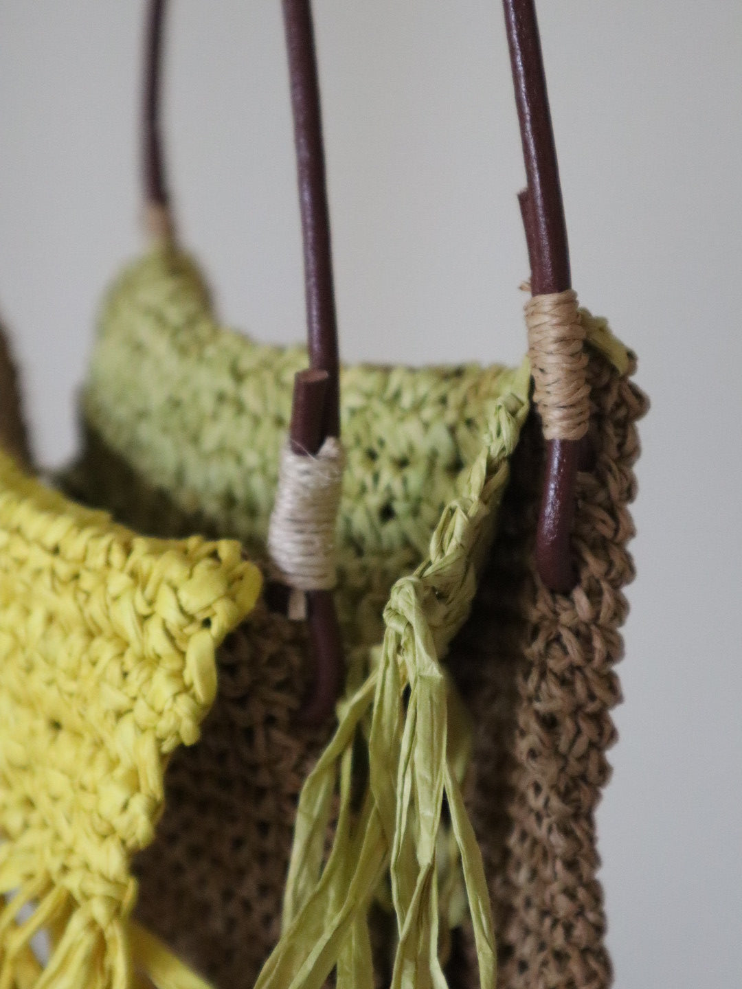 Raffia crochet bag showcasing intricate texture and artisan craftsmanship.