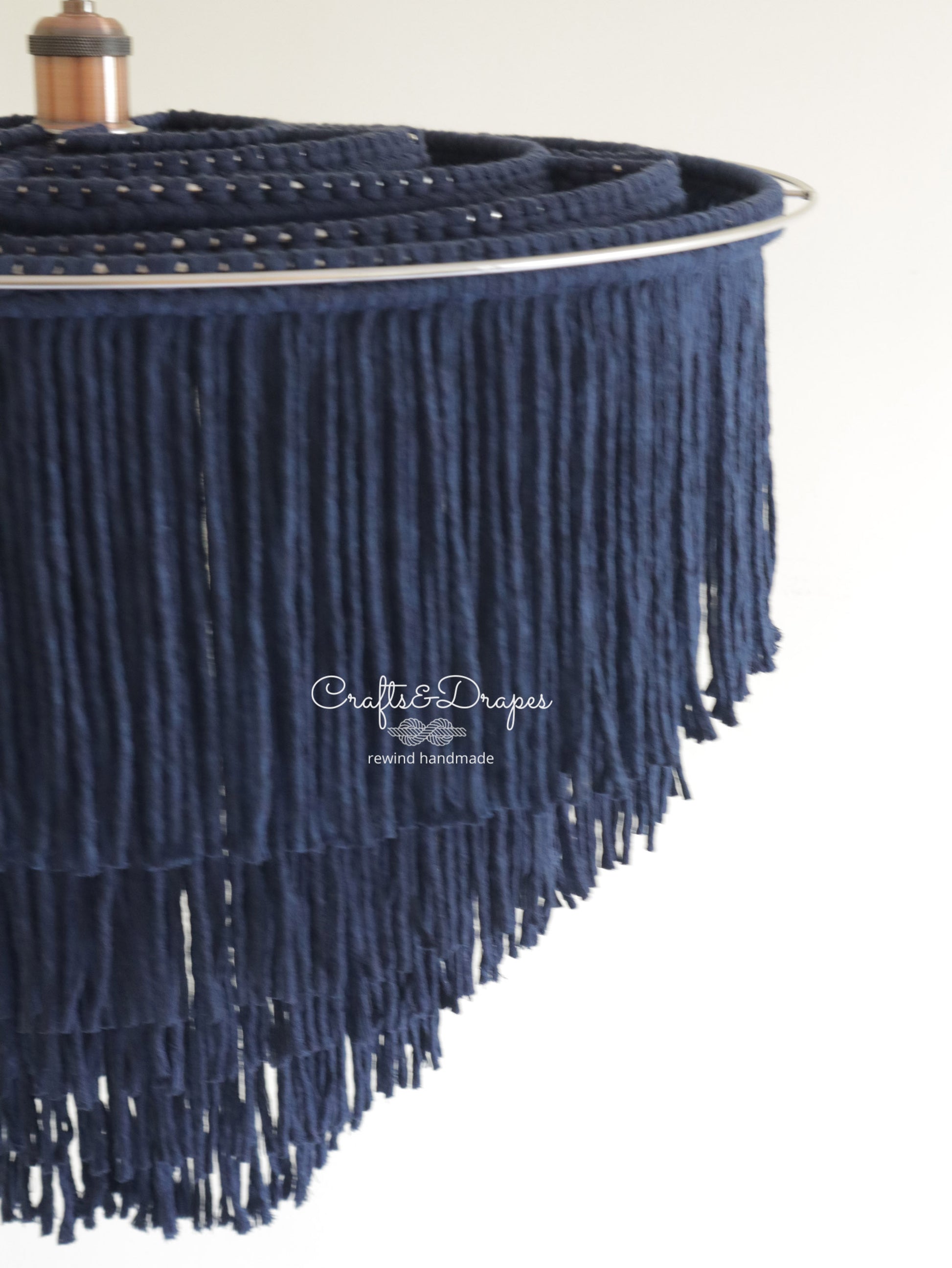 Handcrafted macramé labyrinth chandelier, adding texture and warmth to your space.