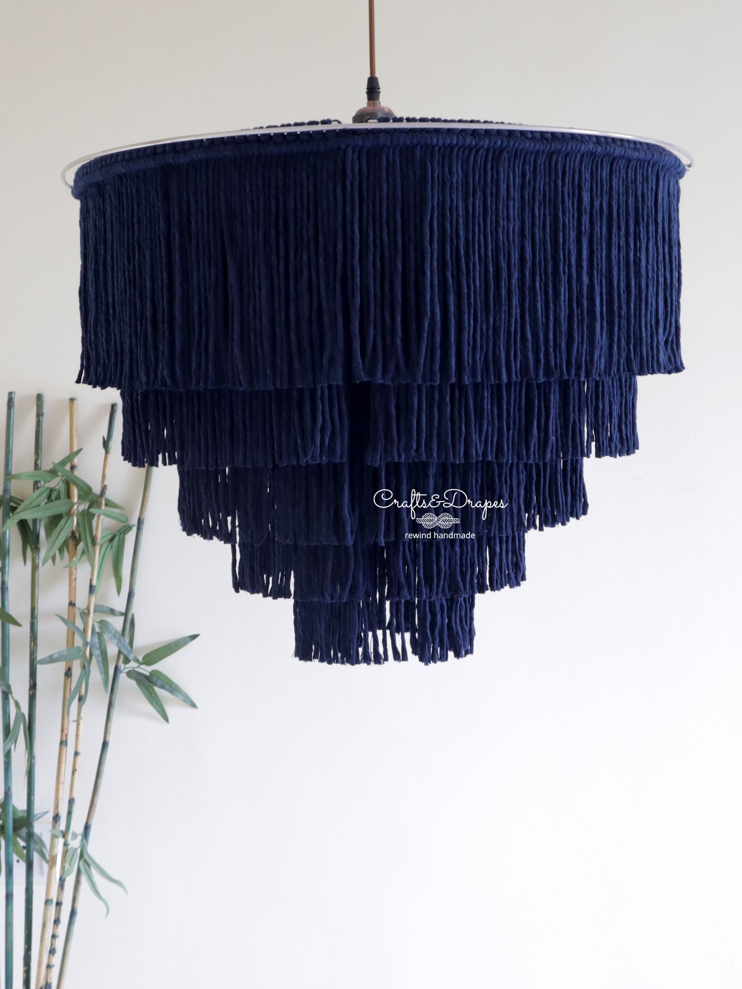 Chic and timeless, the Labyrinth macramé fringe chandelier for a captivating ambiance.