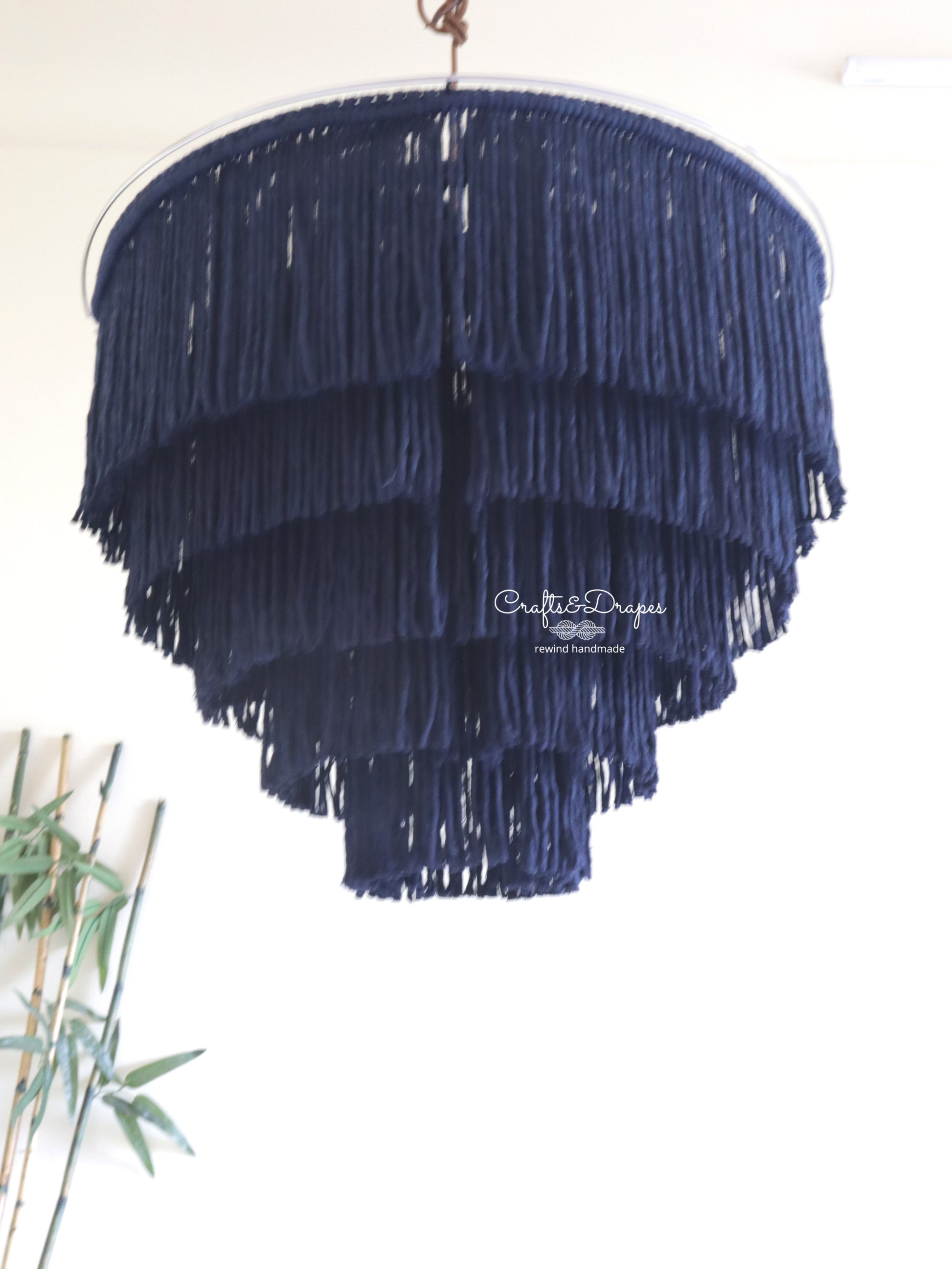 Tiered macramé fringe chandelier – a visual journey through knots and design.