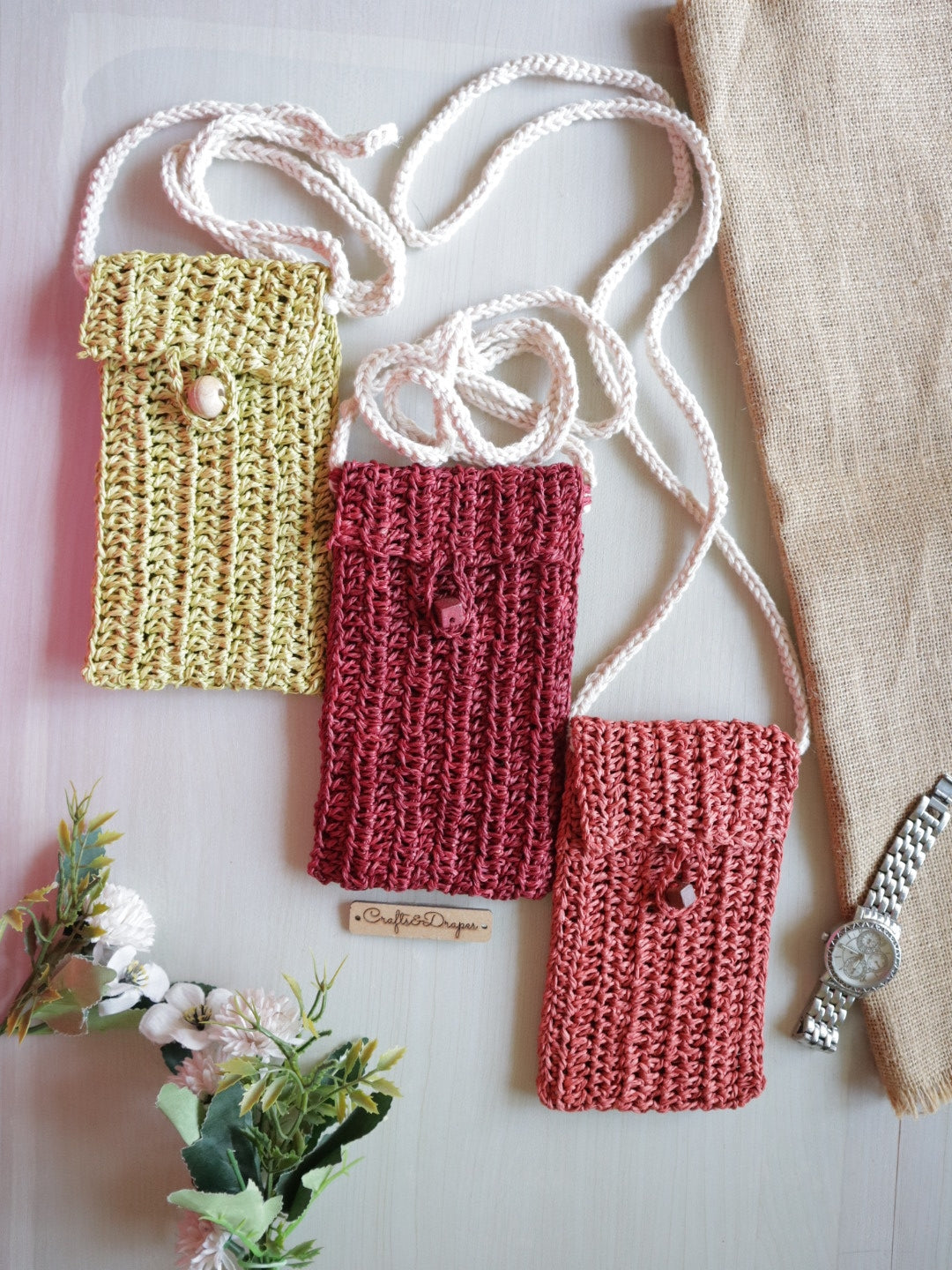 Handwoven crochet bag featuring intricate patterns and earthy colors