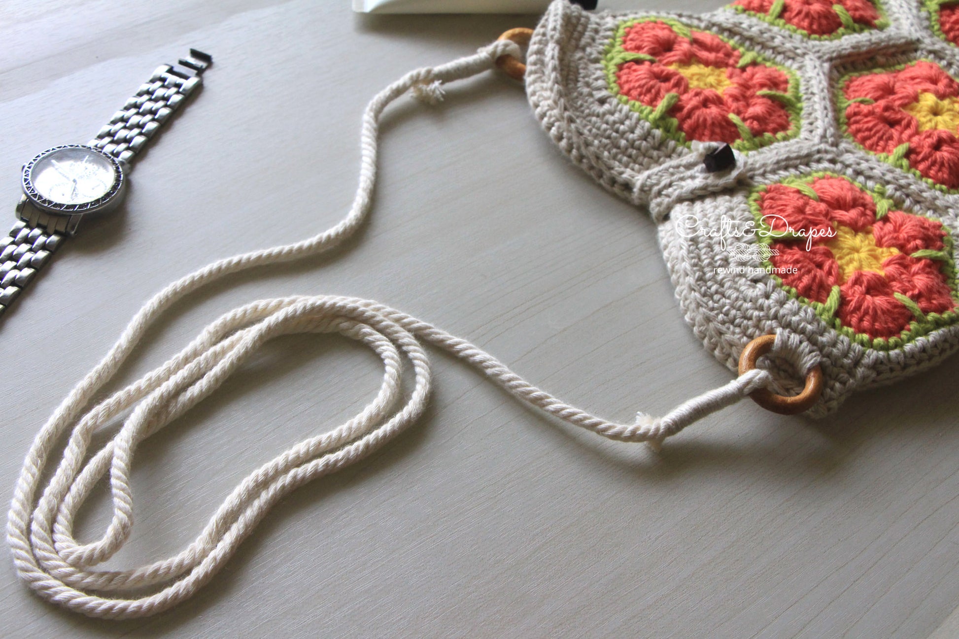 Handwoven African flower square crochet bag showcasing intricate patterns and vibrant colors