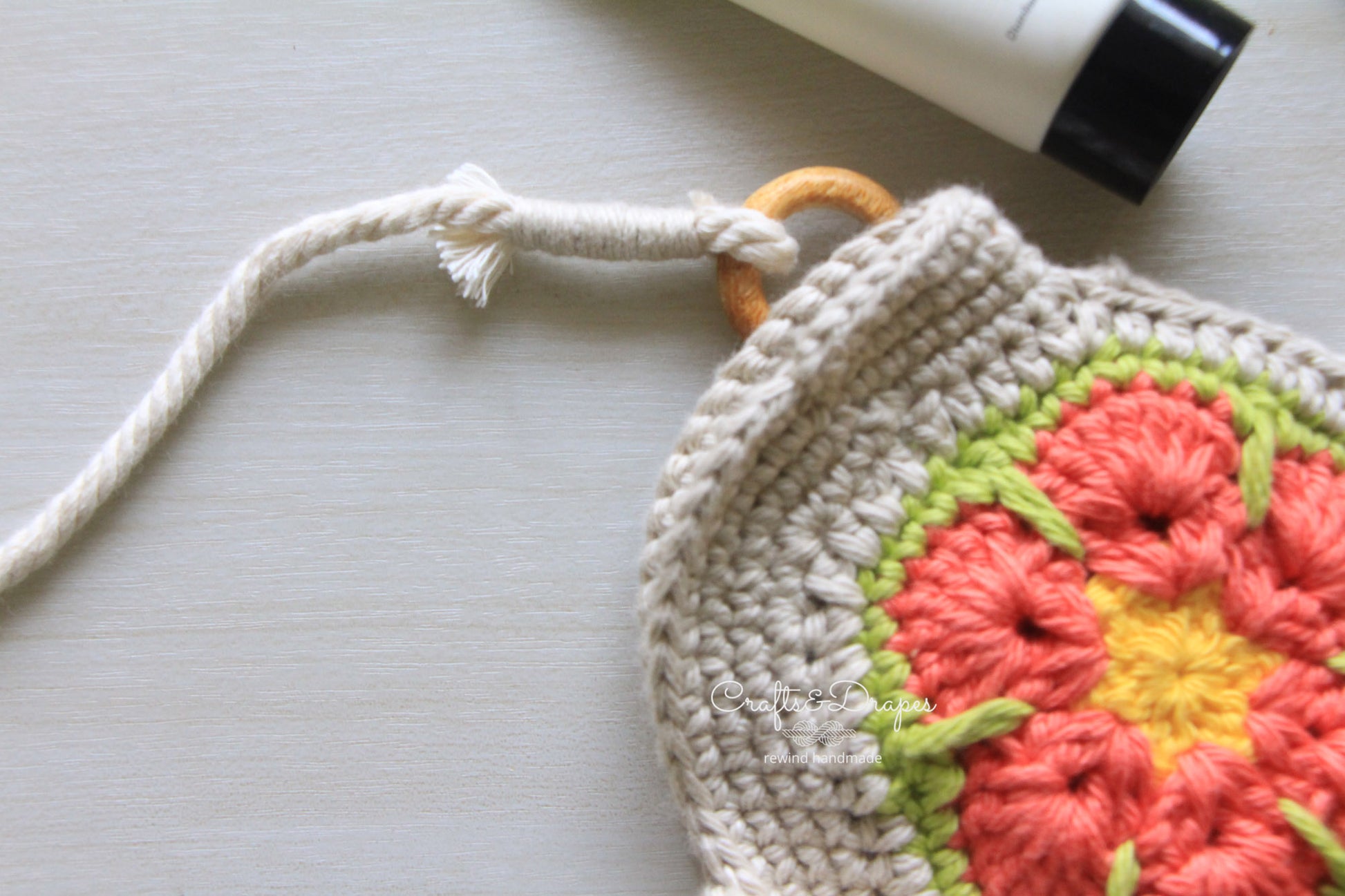 Handwoven African flower square crochet bag showcasing intricate patterns and vibrant colors