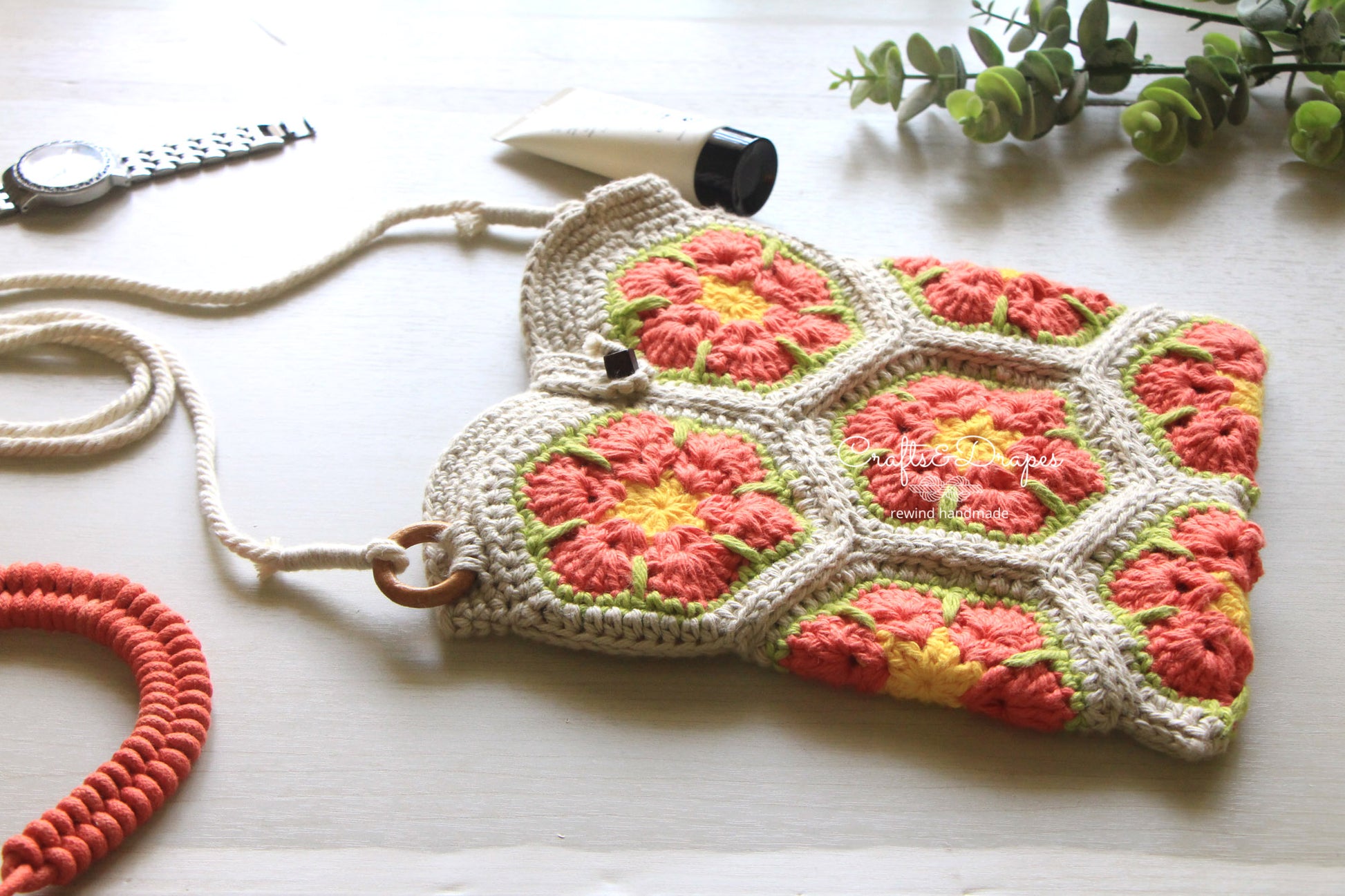 Handwoven African flower square crochet bag showcasing intricate patterns and vibrant colors